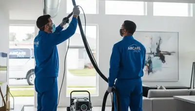 Technician cleaning air ducts for improved HVAC efficiency in Seattle, WA home
